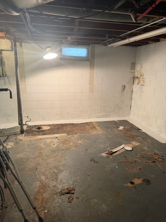 Basement stripped to the block walls after demolition